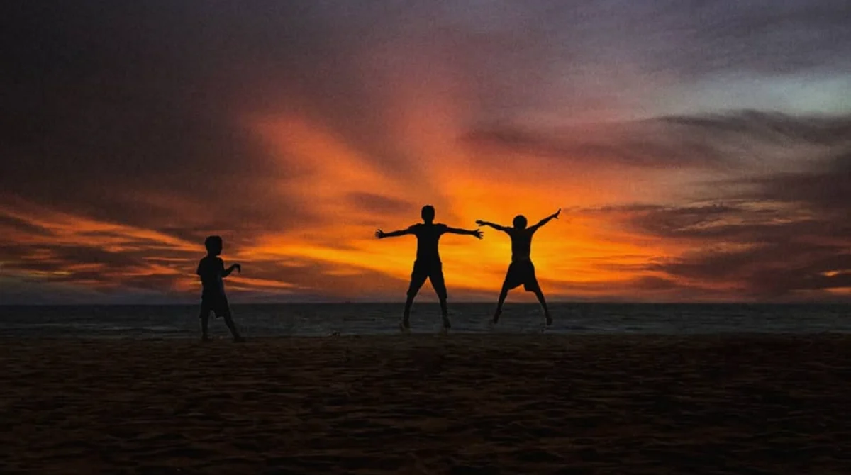 Silhouettes against a sunset