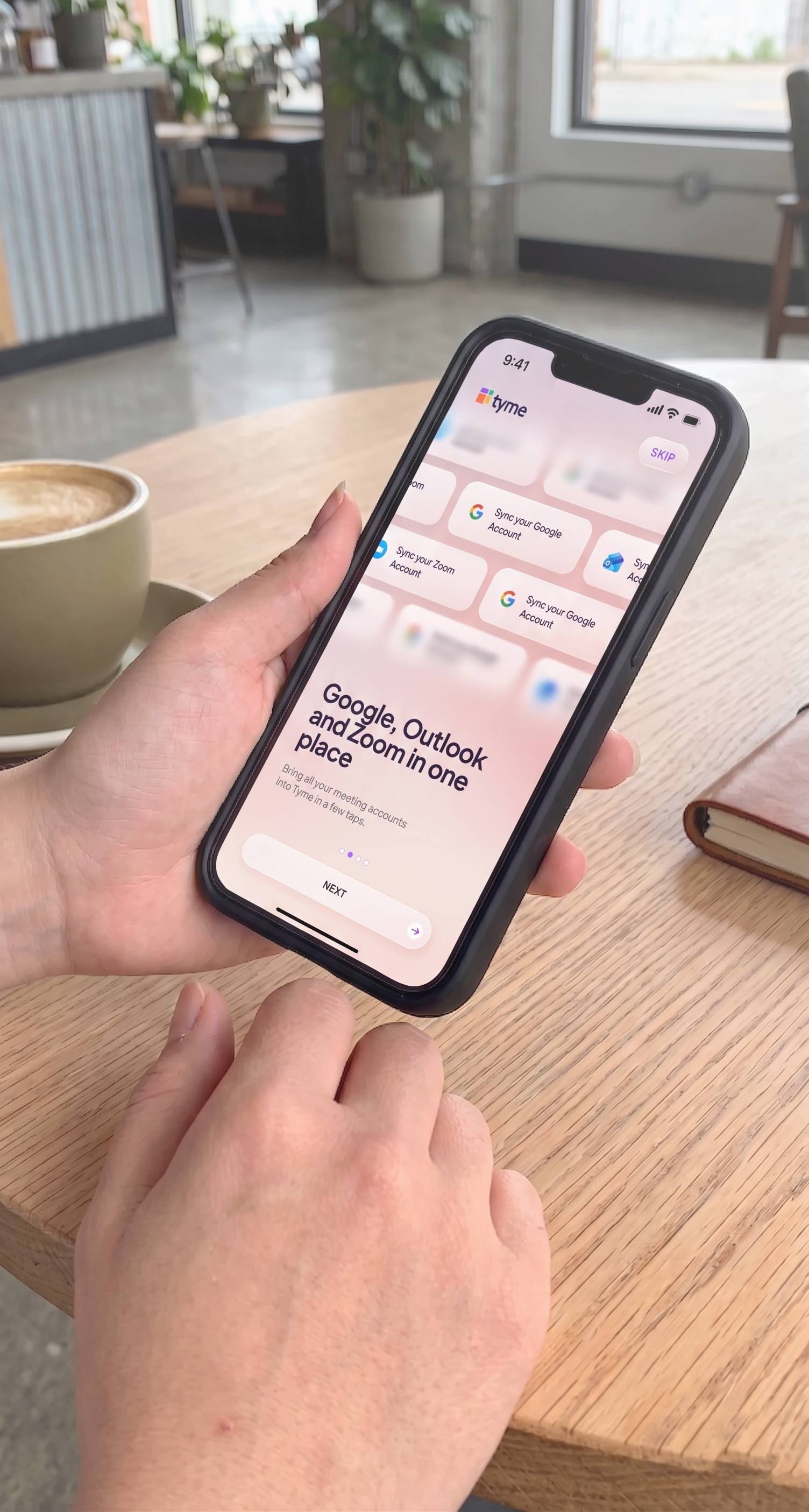 Hands using the Tyme mobile prototype